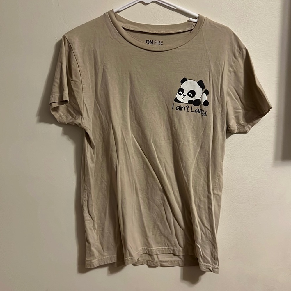 On fire, size large, tan.
